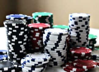 stacked poker chips with different colors