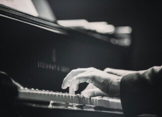 Simply Piano Review person playing piano