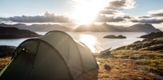 gray tent on top of mountain