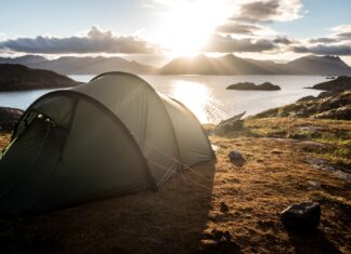gray tent on top of mountain