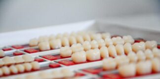 white and red round food on white ceramic plate