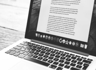 My Experience of Paying for Writing Essays silver MacBook showing application