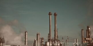 factory under blue and white sky