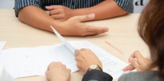 person wearing black coat close-up photography