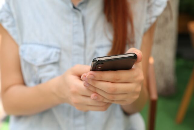Photo by Yura Fresh person holding using iPhone X