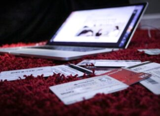 white printer paper on red textile