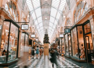 How Shopping AI Can Improve Targeted Marketing Strategies person walking inside building near glass