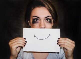 9 Things That Affect Your Mental Health Negatively: Analysis By Experts person holding white printer paper