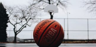 Spalding basketball in court