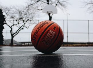 Spalding basketball in court