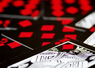 Online Casinos VS. Traditional Casinos – What’s the Difference? red and black game board