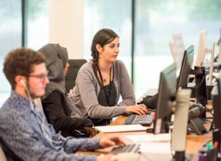 Outsourcing Without Assessing Your Needs and Budget unknown persons using computer indoors