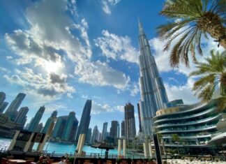 Rent or Buy: Top Dubai Areas for Apartments white and gray high rise buildings near body of water during daytime