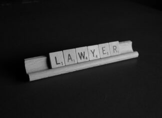 How to Find the Right Personal Injury Lawyer for Your Case brown wooden scrable