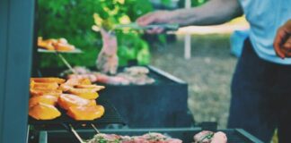 person grilling meat