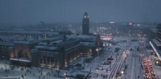 aerial photography of street at night covered with snow