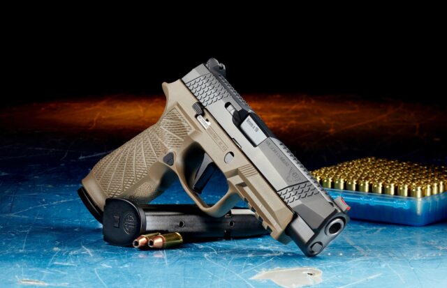 Photo by steve woods black and silver semi automatic pistol