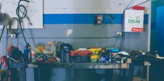 assorted-color handheld tools on work bench