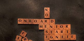 a scrabble of words that say no on board, mentor, start,