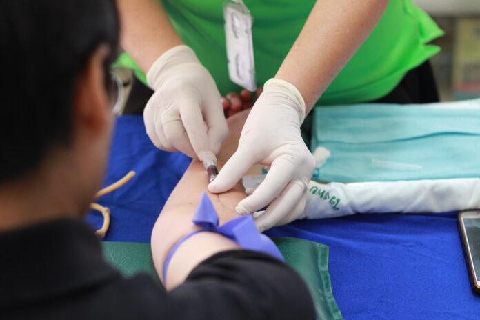 free-person-getting-his-blood-check-stock-photo Free Person Getting His Blood Check Stock Photo