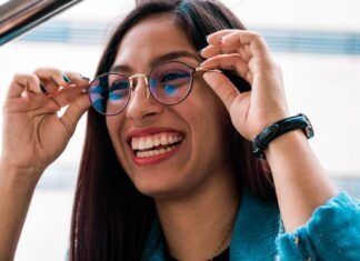 Trendy Glasses for Women That Can’t Be Missed woman wearing eyeglasses with black frame