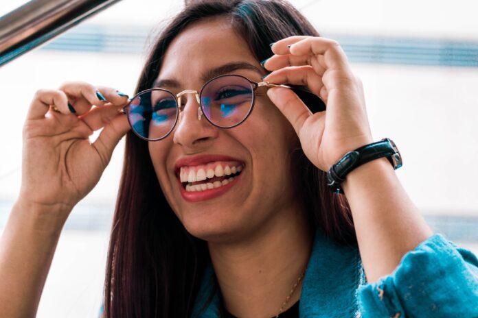 Photo by Susan Duran woman wearing eyeglasses with black frame