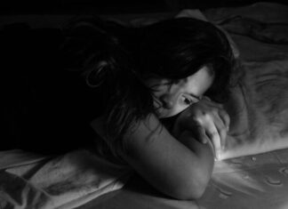 How to File for a Protection from Abuse Order: A Step-by-Step Guide? woman leaning on bed