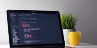 black and silver laptop computer on table