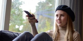 a woman sitting on a couch