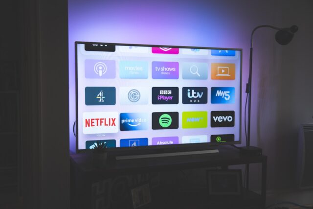 Photo by Nicolas J Leclercq black flat screen tv turned on showing game