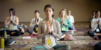 group of people doing yoga