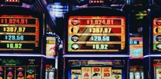 a row of slot machines sitting next to each other