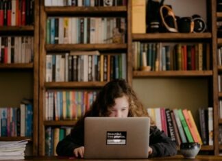 How to Use Technology to Help Middle School Math Students woman in black long sleeve shirt using macbook