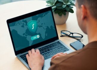 How to Identify and Repair Cybersecurity Blind Spots person using macbook pro on white table