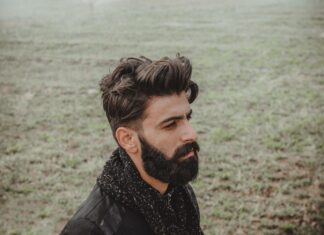 How to Choose a Men’s Custom Hair Systems? man in black leather jacket standing near body of water during daytime