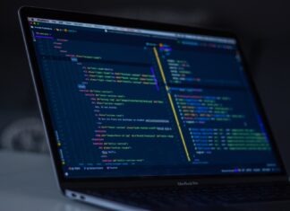 The Benefits of Outsourcing Software Development: Why Your Business Needs It turned-on MacBook Pro wit programming codes display