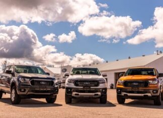The Top Benefits of Choosing a Gooseneck Car Hauler for Hauling Your Vehicles green and yellow chevrolet car on brown sand under blue and white sunny cloudy sky during