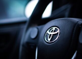 Discover the Top 5 Fuel-Efficient Toyota Cars From the Latest 2023 Models Available in KSA black toyota car steering wheel