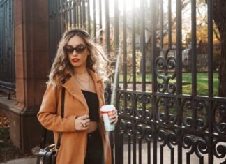 How Models Were Replaced by Influencers and Content Creators as Role Models for Beauty woman in brown coat holding white cup