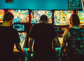 Smart Bets: The Role of Technology in Online Betting people playing arcade machines