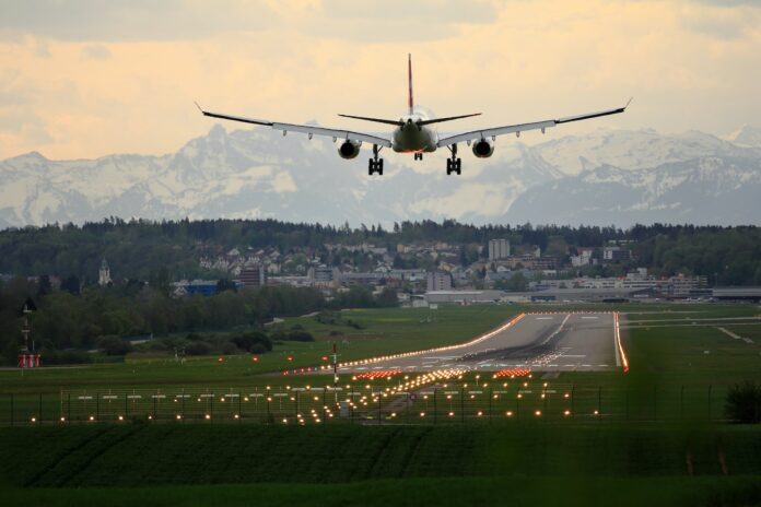 Photo by Pascal Meier white biplane