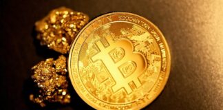 gold round coin on black textile