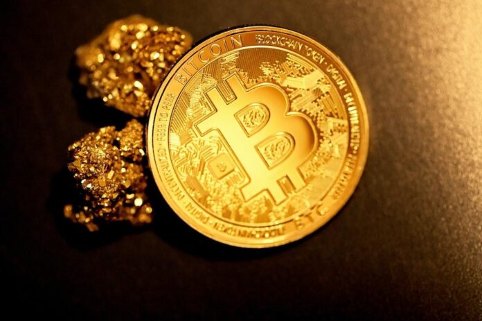 gold-round-coin-on-black-textile gold round coin on black textile
