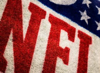 Wearable Technology in the NFL: Monitoring Performance and Preventing Injuries red, white, and blue NFL area rug