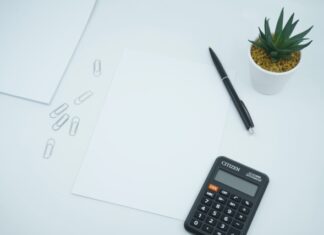 A Stepwise Procedure to Apply for an Affordable Personal Loan black calculator beside black pen on white printer paper