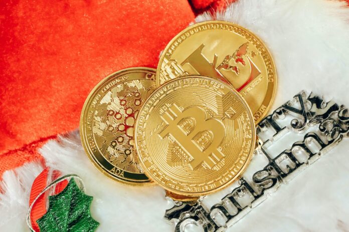 Photo by Traxer two gold bitcoins sitting next to each other