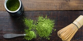 green powder and spoon on board