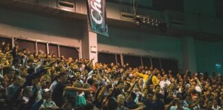 people sitting on chair inside building