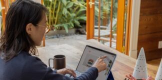 a woman using a laptop