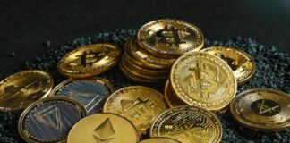 a pile of bitcoins sitting on top of a pile of gravel